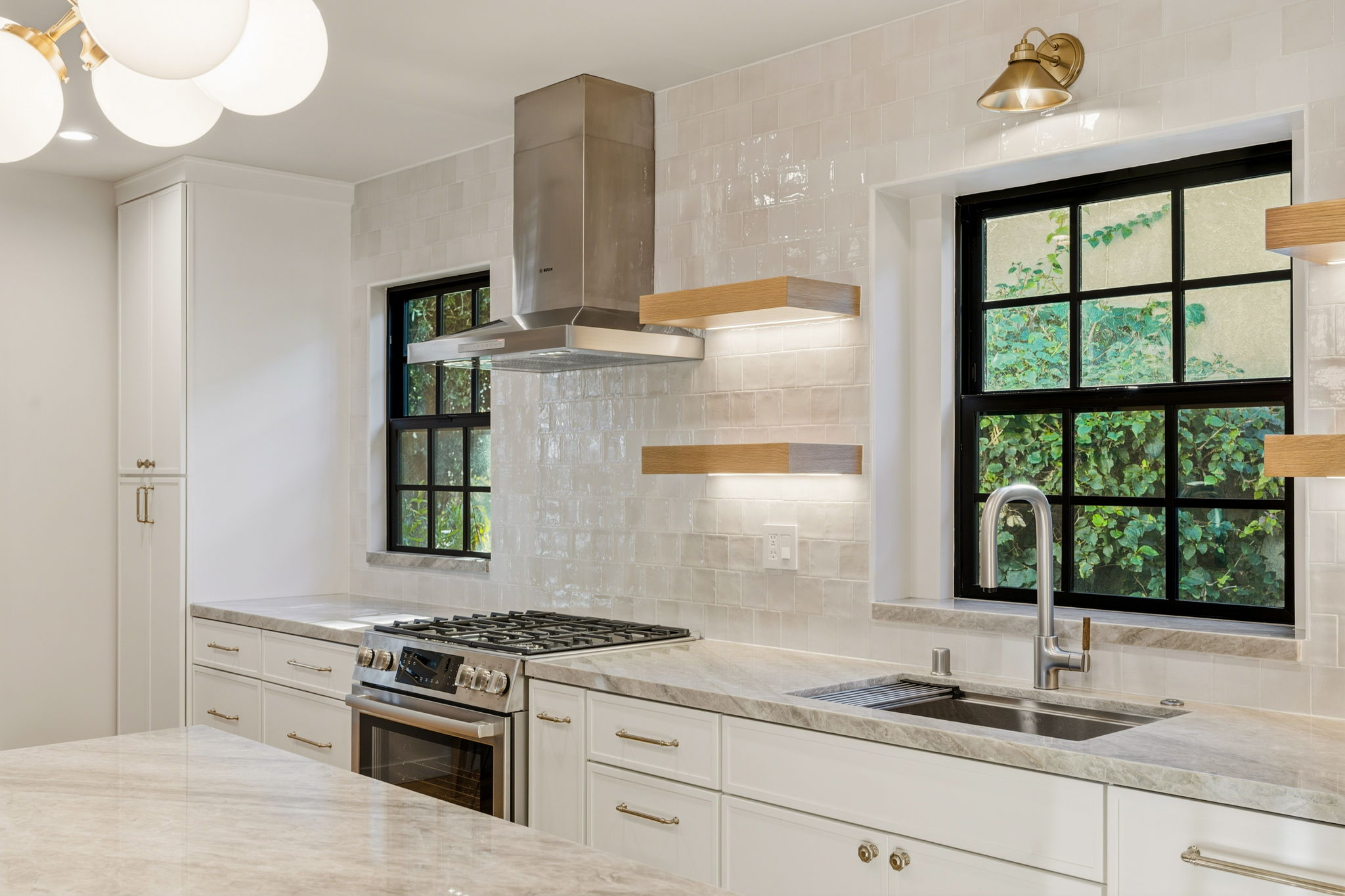 - Oasis Builders, Inc. Porcelain Tile Backsplash Kitchen Renovation