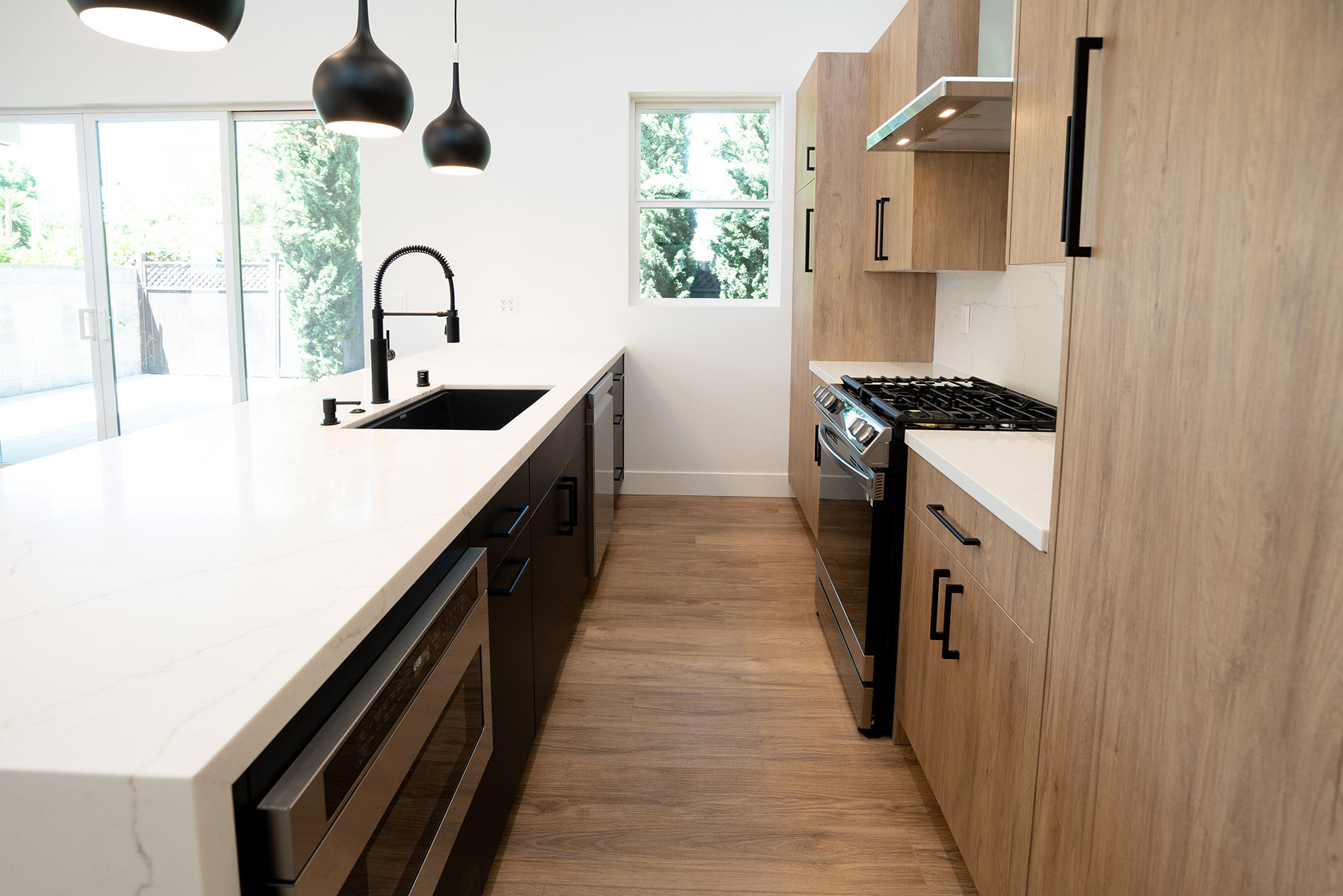 - Oasis Builders, Inc. ADU Kitchen European Style Cabinets