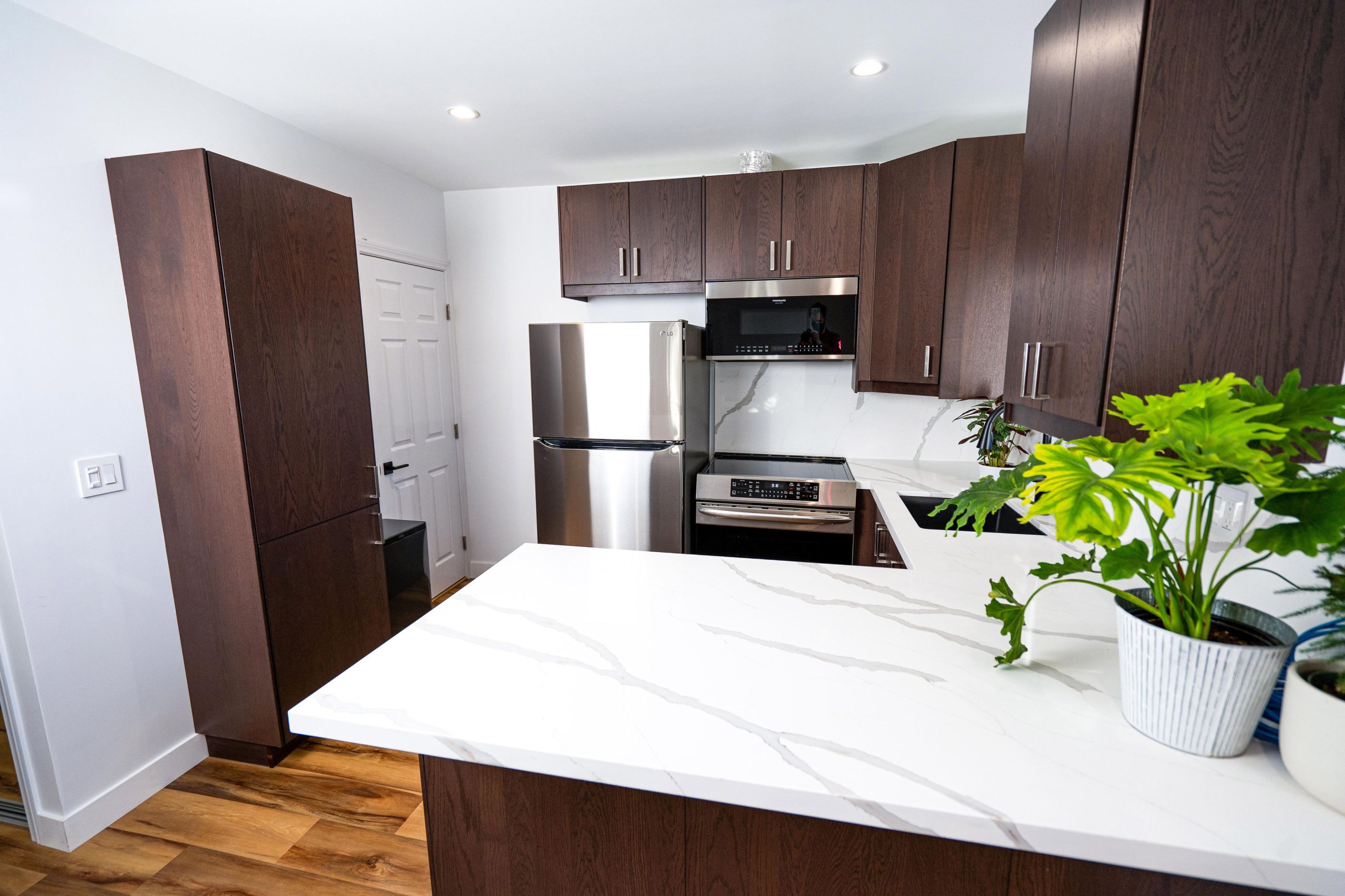 - Oasis Builders, Inc. Studio ADU Kitchen