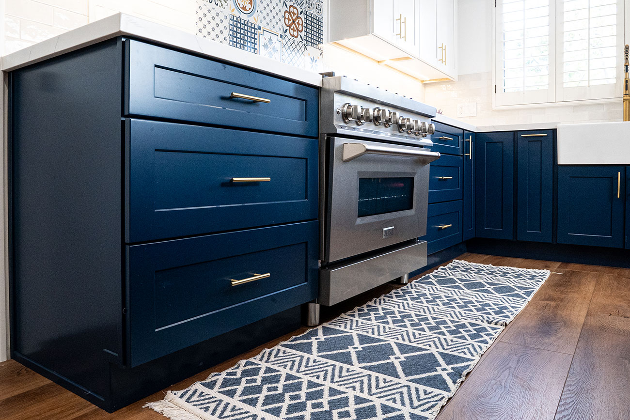 - Oasis Builders, Inc. Blue Kitchen Cabinets