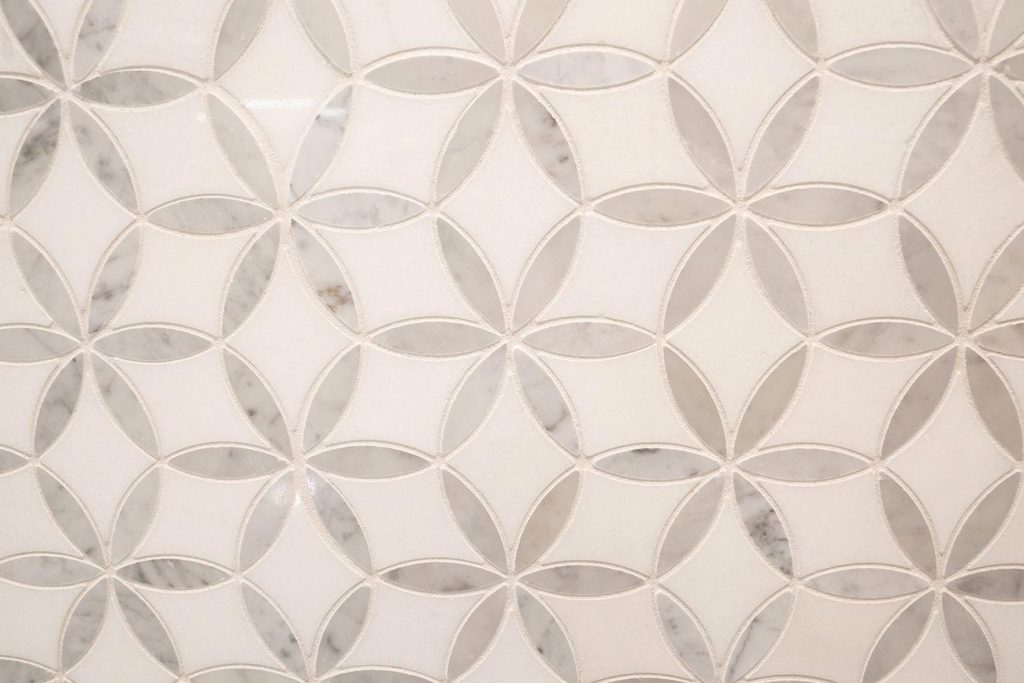 - Oasis Builders, Inc. Calacatta Petal Mosaic Tile