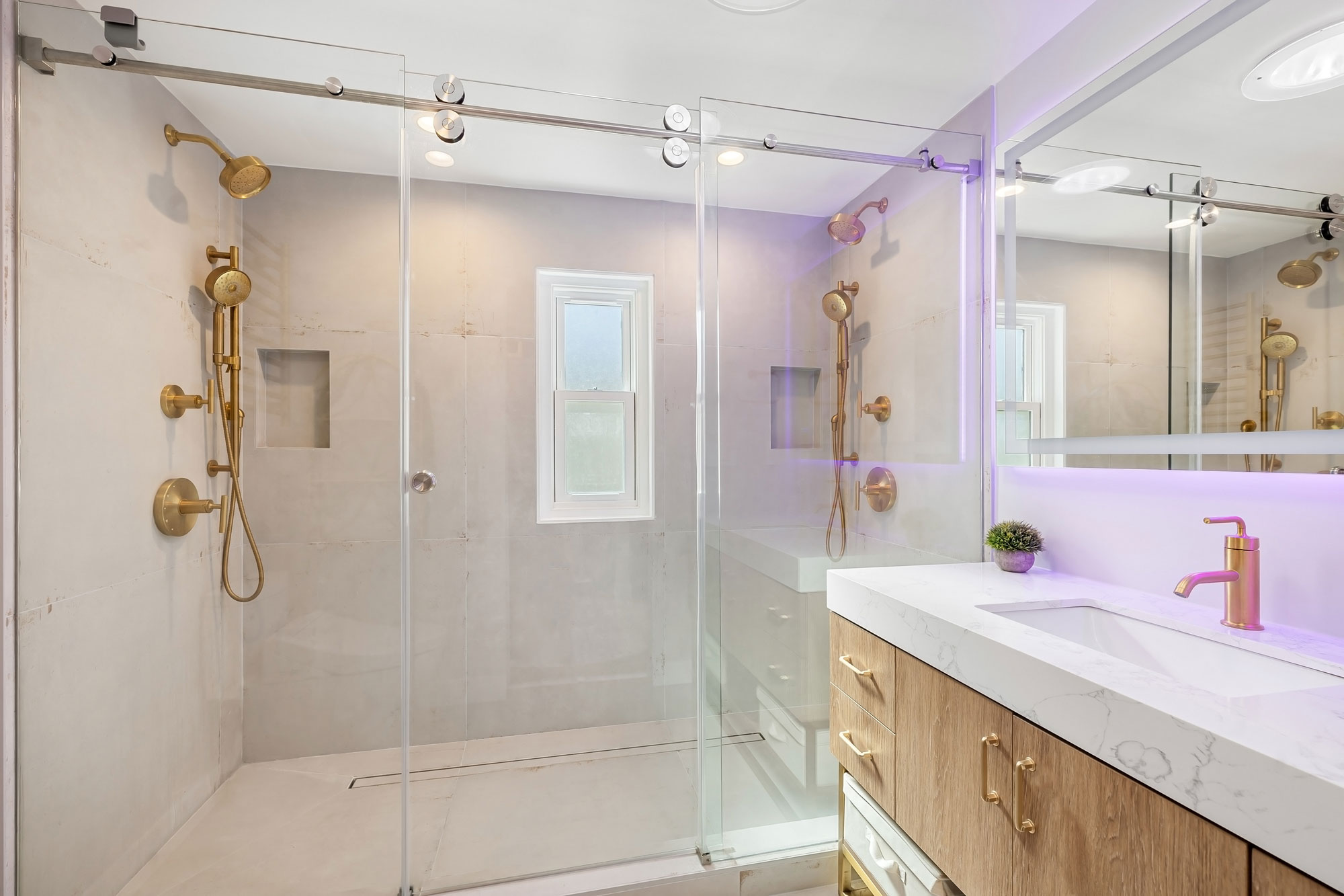 - Oasis Builders, Inc. Dual Shower and Brass Fixtures