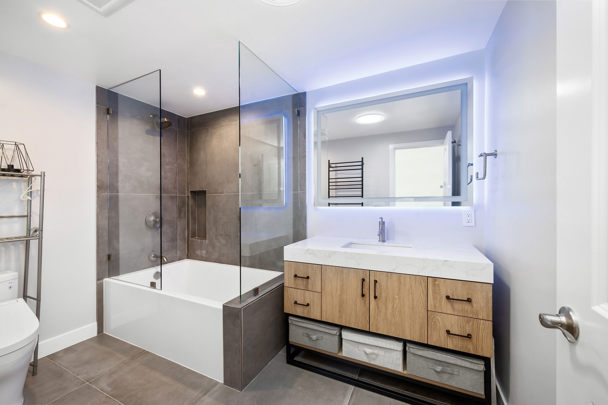 - Oasis Builders, Inc. Glass Tub Shower and and Porcelain Floor Tile