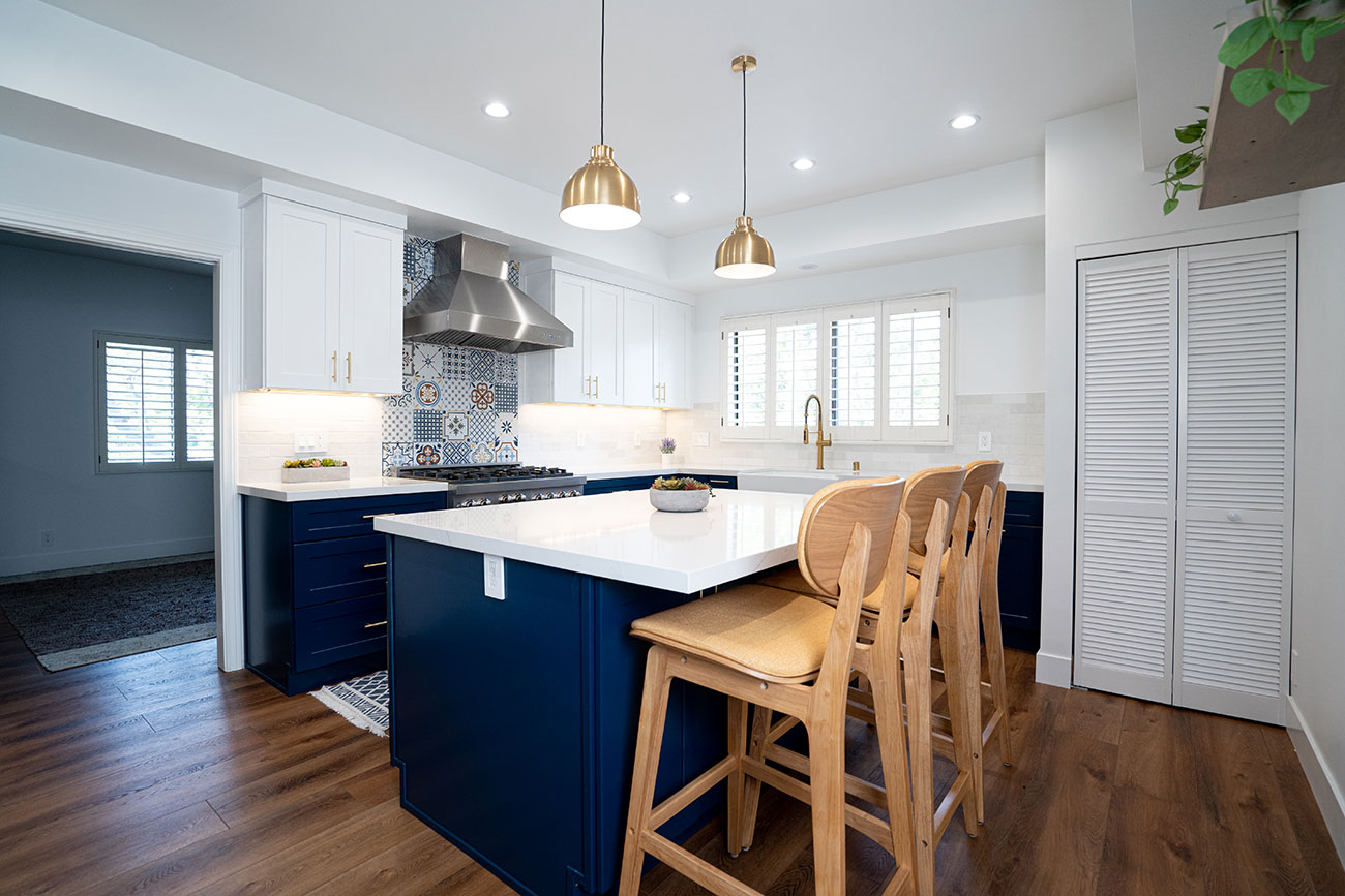 - Oasis Builders, Inc. Kitchen Island with Quartz Countertop