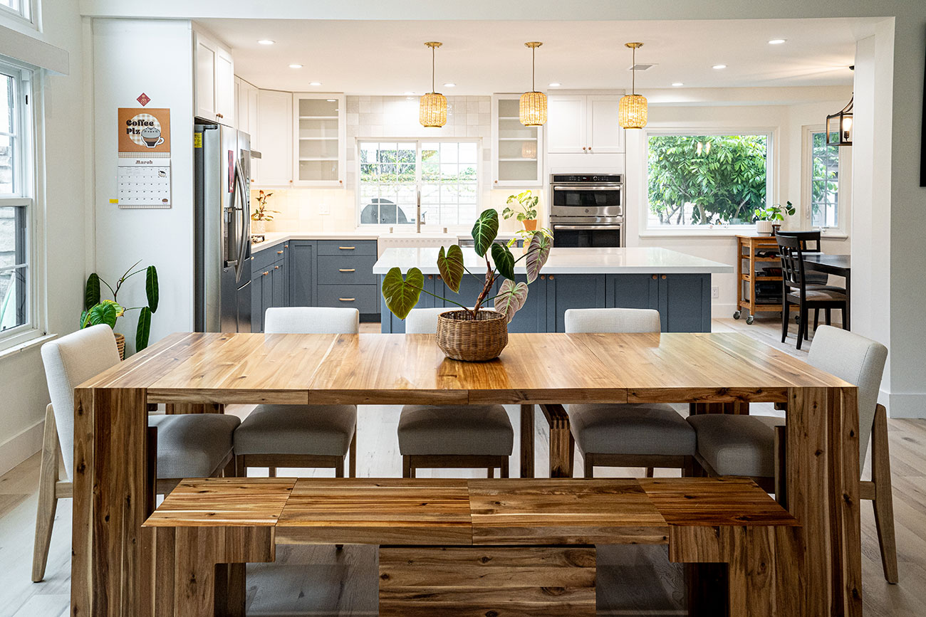 - Oasis Builders, Inc. Frameless kitchen cabinets in white for the uppers